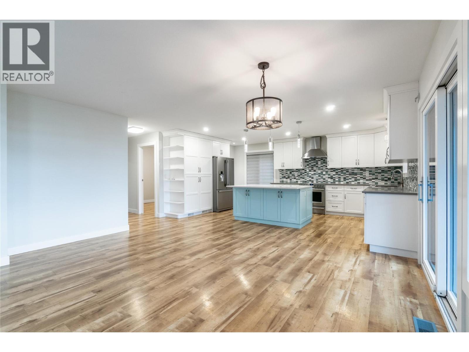 living room / dining room to kitchen - 401 97A Highway, Sicamous, BC - Indoor Photo Showing Kitchen With Upgraded Kitchen