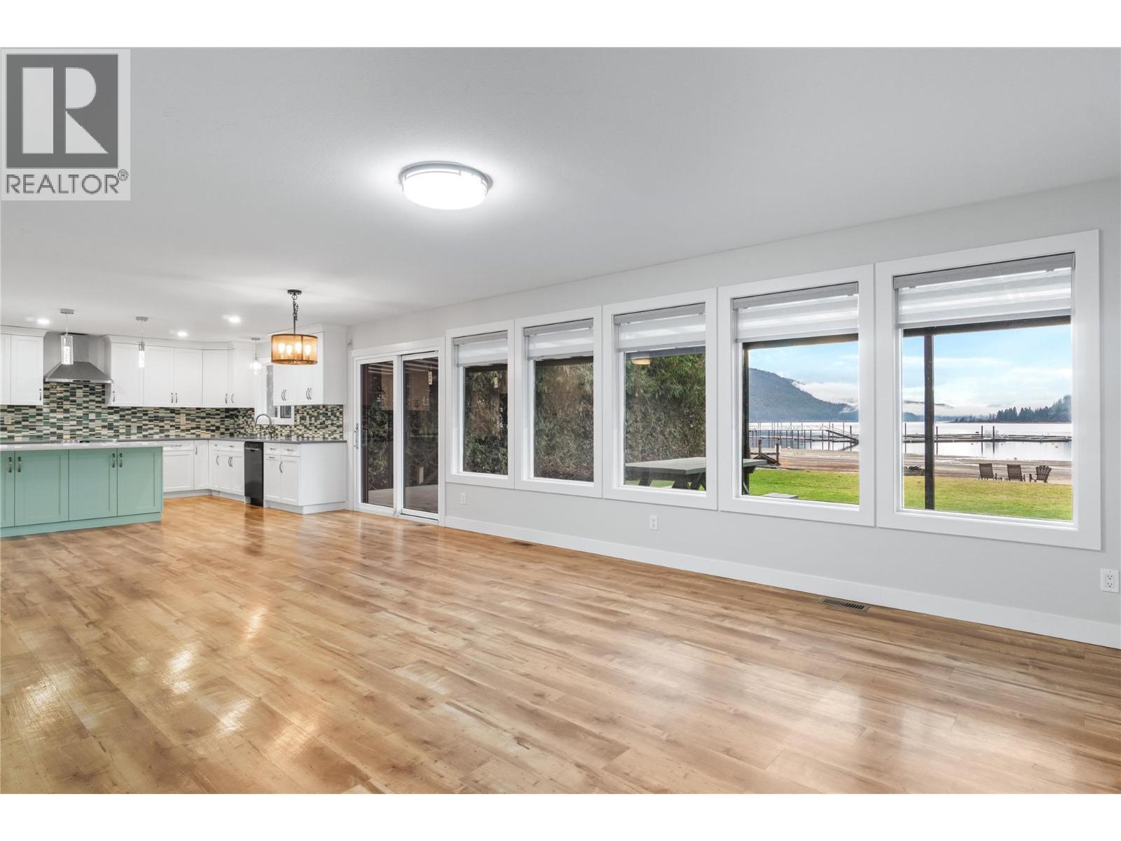 living room / dining room to kitchen - 401 97A Highway, Sicamous, BC - Indoor