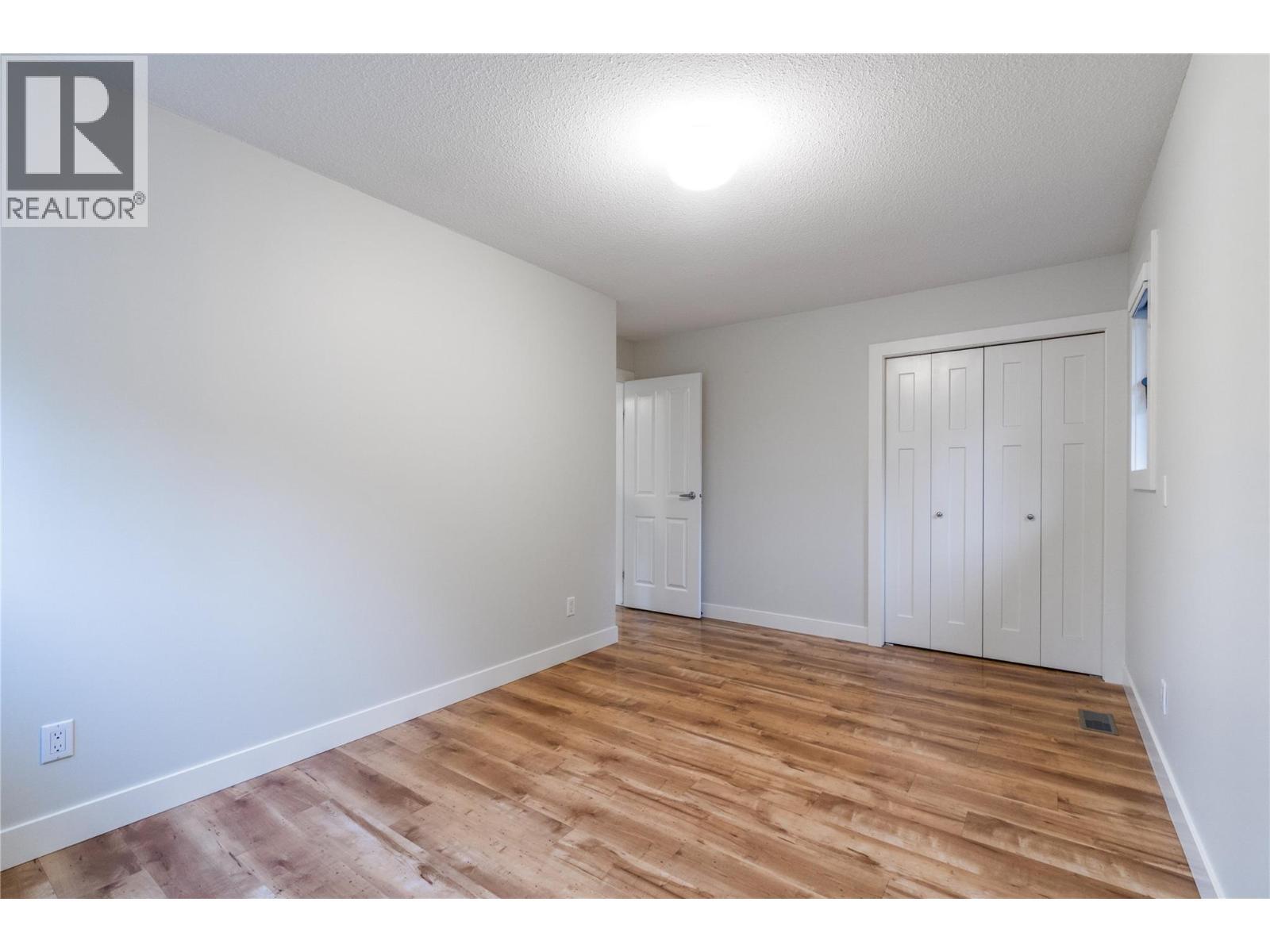 bedroom 1 - 401 97A Highway, Sicamous, BC - Indoor Photo Showing Other Room