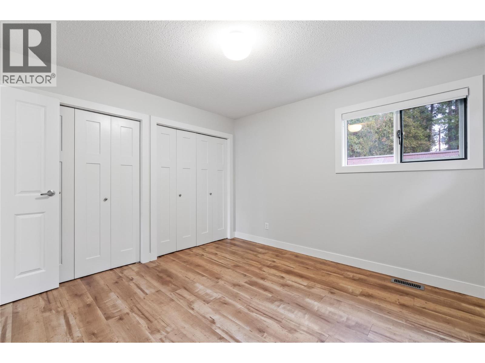 bedroom 2 - 401 97A Highway, Sicamous, BC - Indoor Photo Showing Other Room