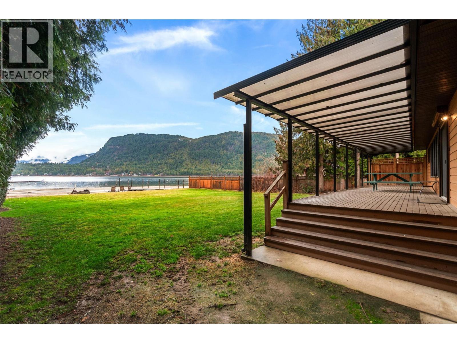 front deck - 401 97A Highway, Sicamous, BC - Outdoor With Deck Patio Veranda