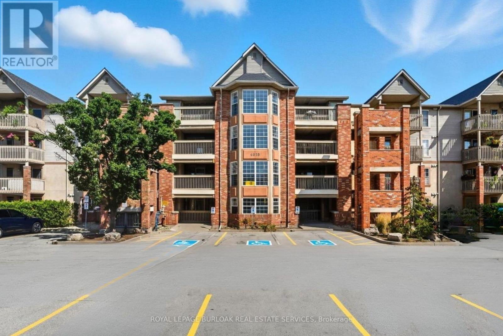 407 - 4013 Kilmer Drive, Burlington, ON - Outdoor With Balcony With Facade