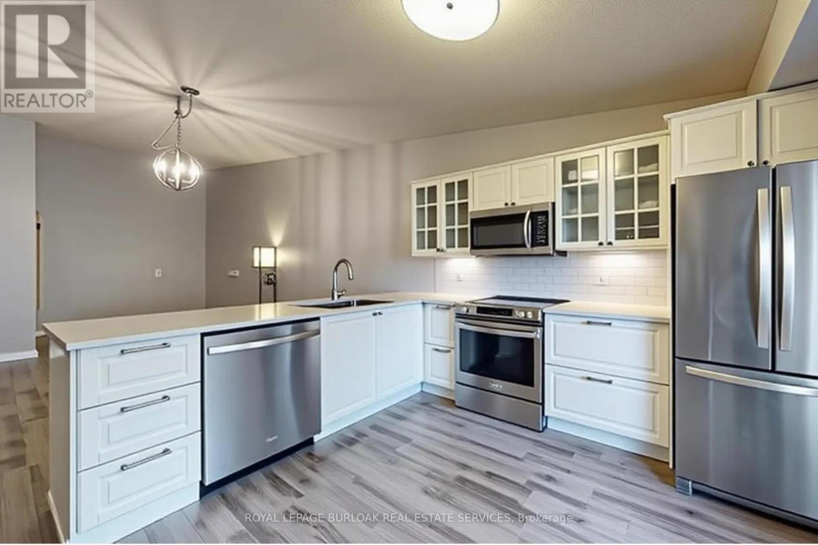 407 - 4013 Kilmer Drive, Burlington, ON - Indoor Photo Showing Kitchen With Stainless Steel Kitchen With Upgraded Kitchen