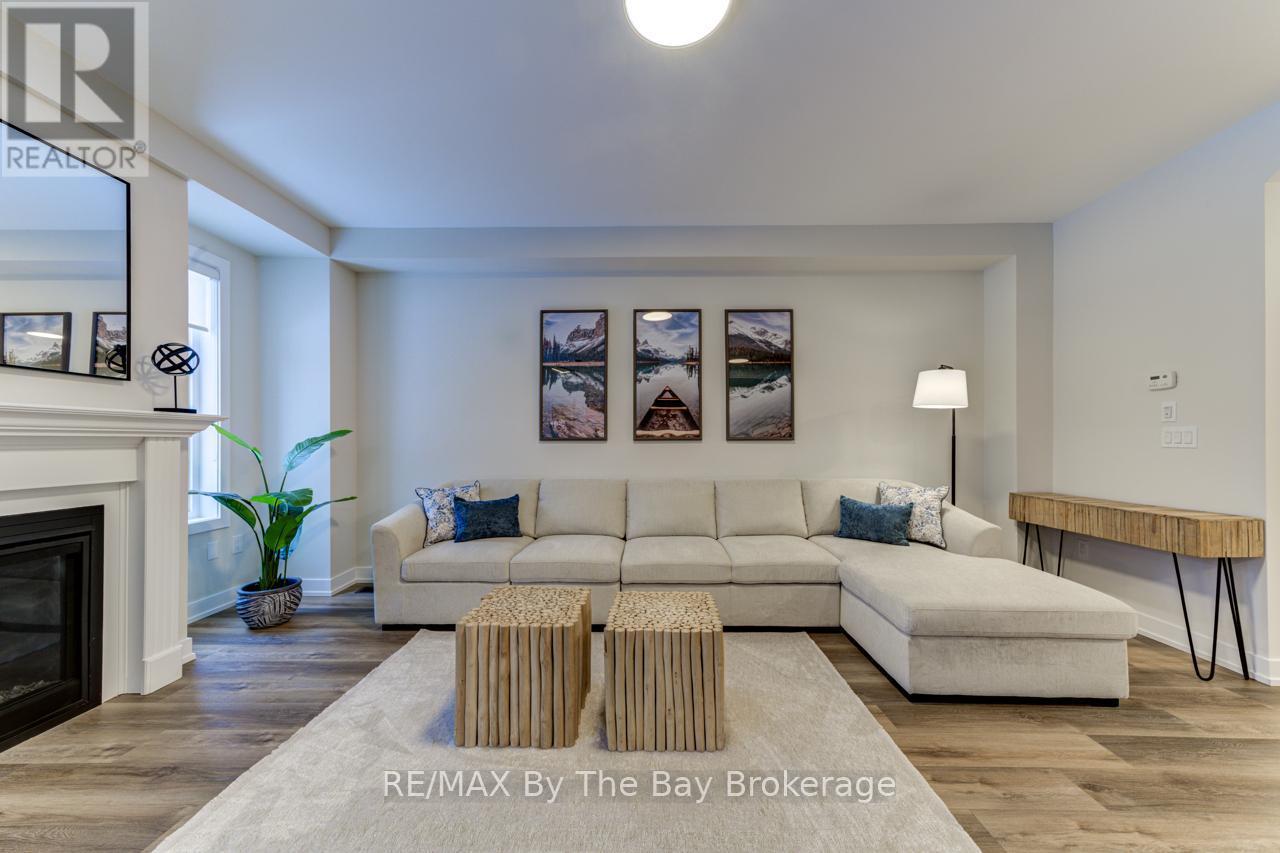 80 - 190 Crosswinds Boulevard, Blue Mountains, ON - Indoor Photo Showing Living Room With Fireplace