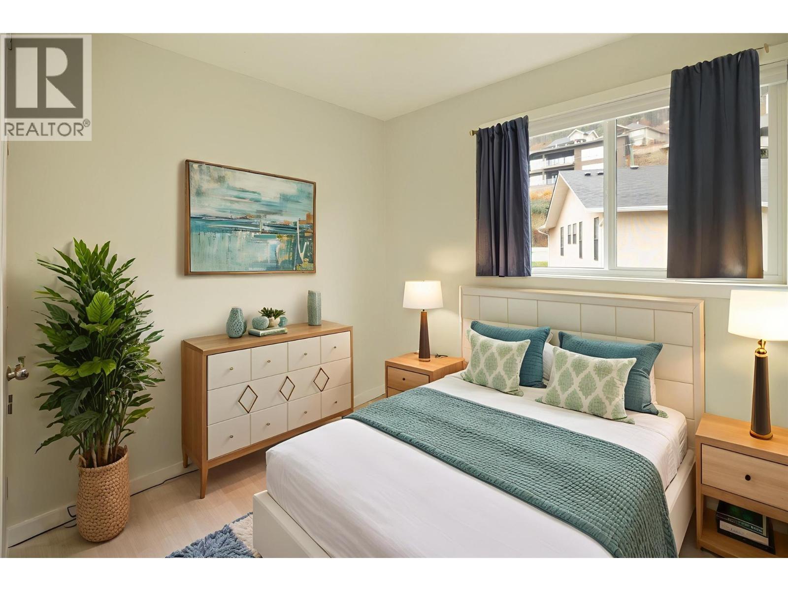 *Virtually staged - 4790 Seaton Place, Peachland, BC - Indoor Photo Showing Bedroom