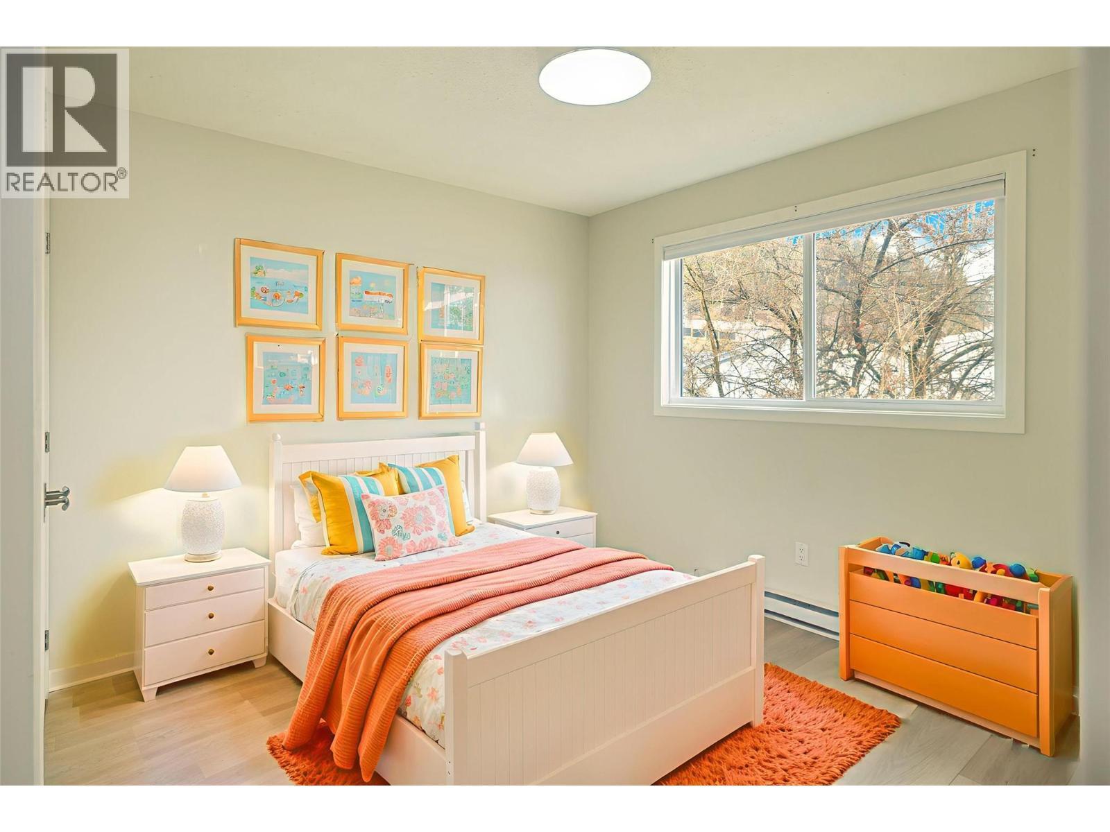 *Virtually staged - 4790 Seaton Place, Peachland, BC - Indoor Photo Showing Bedroom
