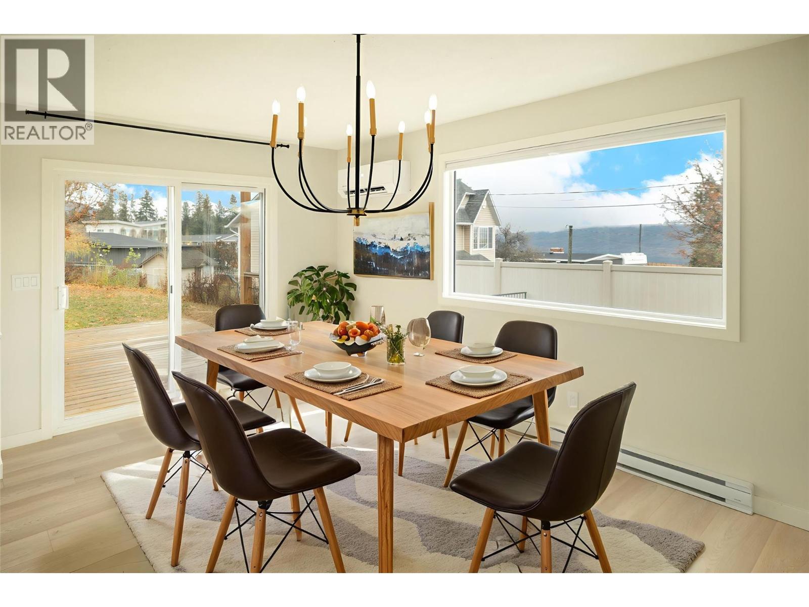 *Virtually staged - 4790 Seaton Place, Peachland, BC - Indoor Photo Showing Dining Room