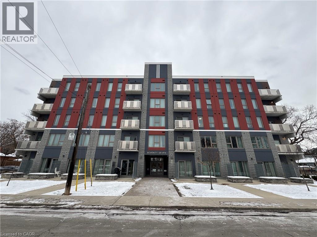 View of apartment building / complex - 77 Leland Street Unit# 223, Hamilton, ON - Outdoor With Facade
