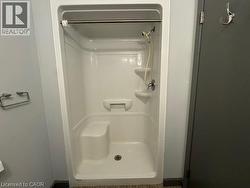 Bathroom featuring a shower stall -