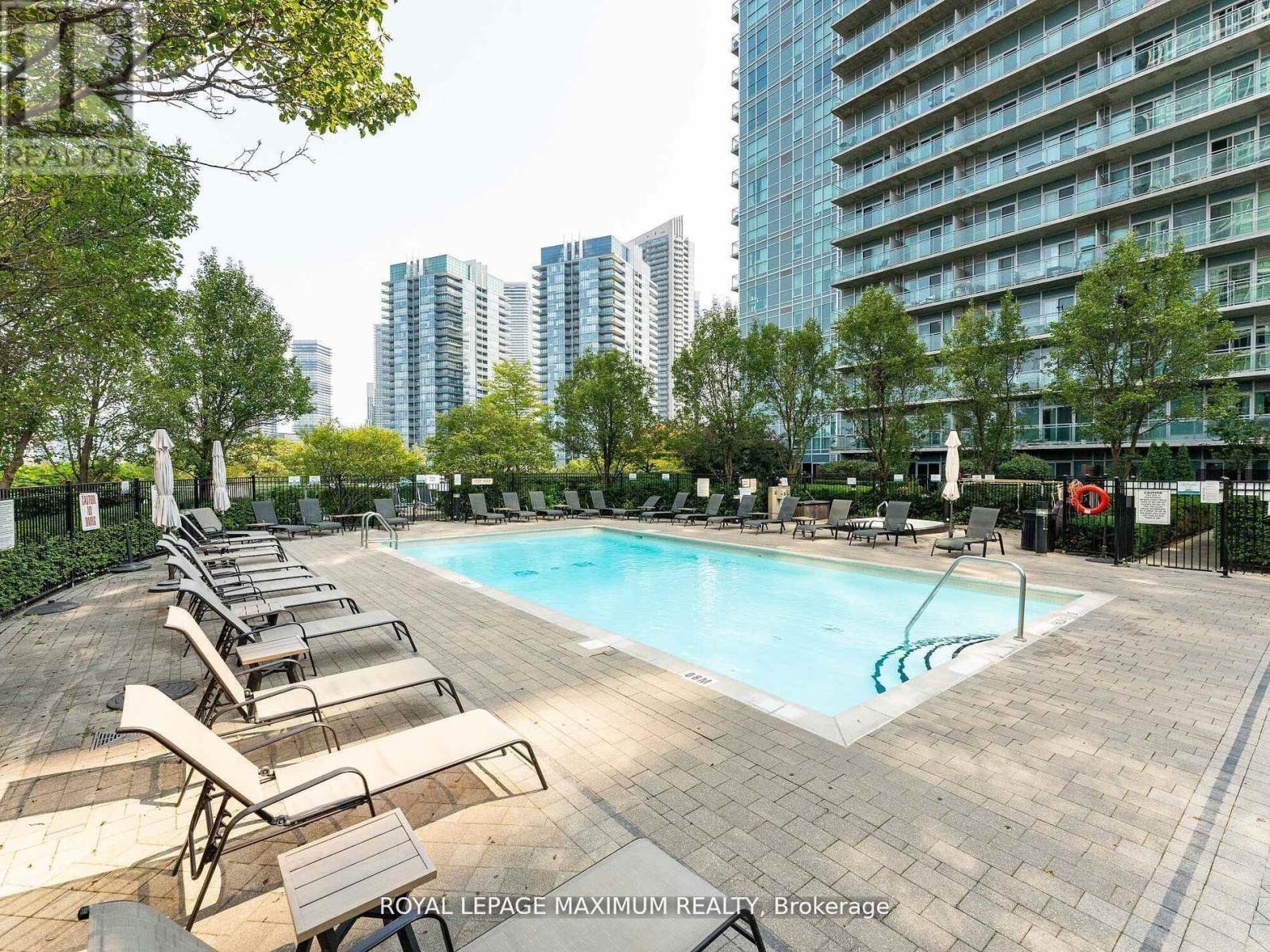 1013 - 155 Legion Road N, Toronto, ON - Outdoor With In Ground Pool