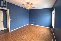 Primary Bedroom w Walk-In Closet -