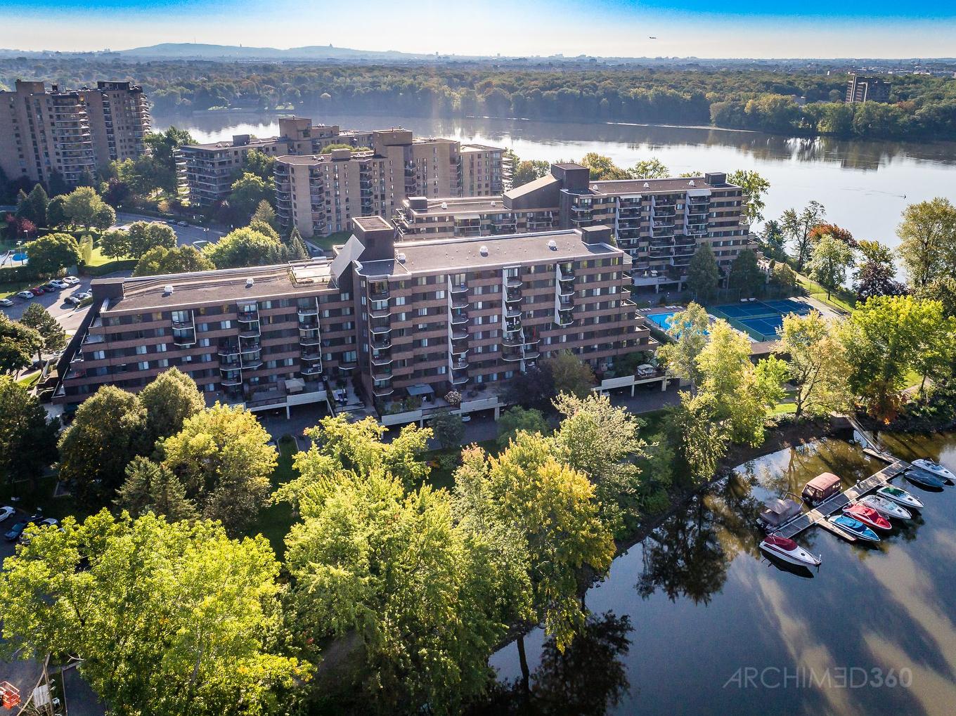 Photo aérienne - 601-4560 Prom. Paton, Laval (Chomedey), QC - Outdoor With Body Of Water With View