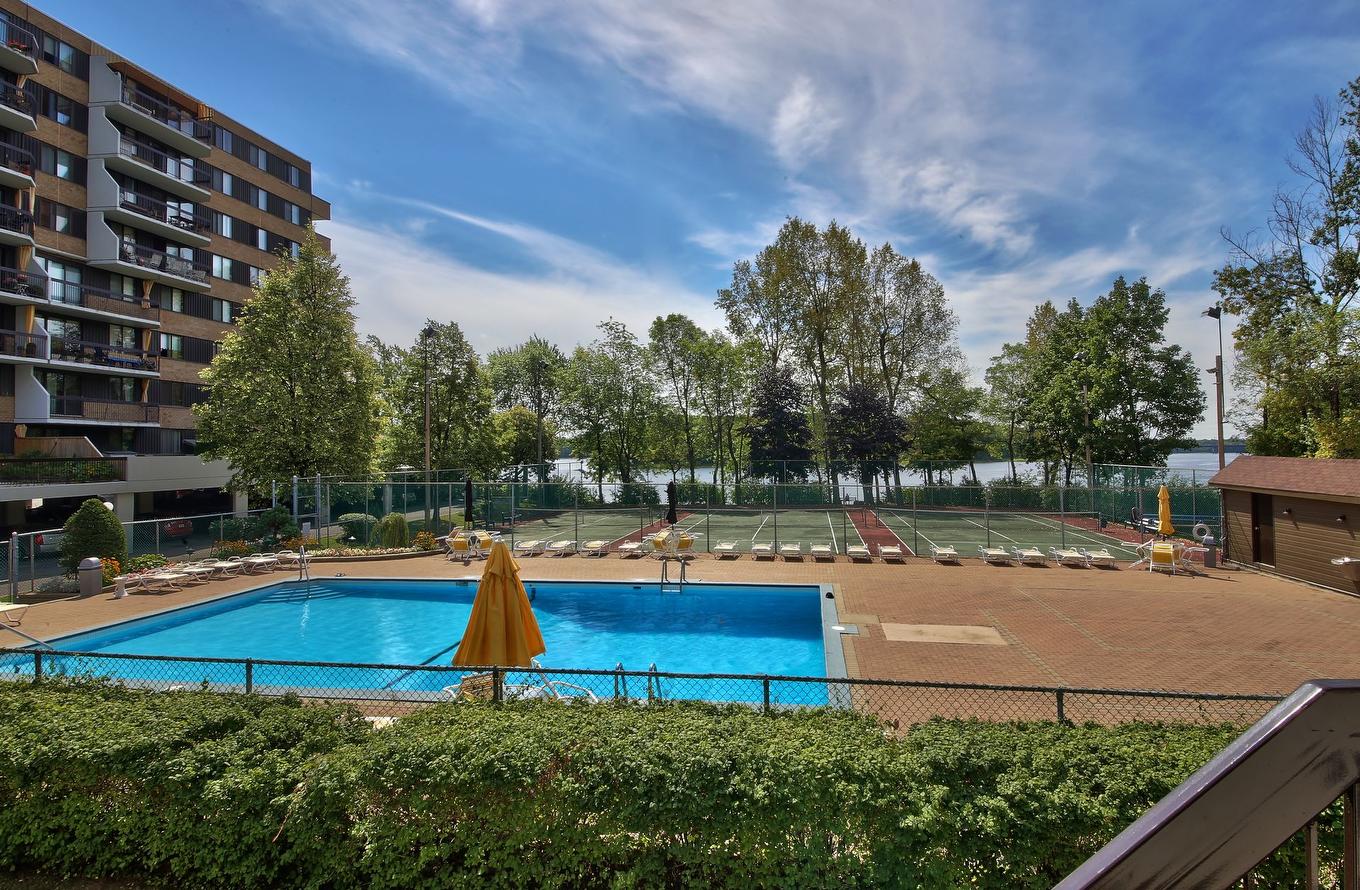 Piscine - 601-4560 Prom. Paton, Laval (Chomedey), QC - Outdoor With In Ground Pool With Backyard