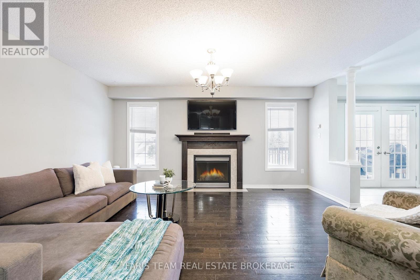 1373 Hunter Street, Innisfil, ON - Indoor Photo Showing Living Room With Fireplace