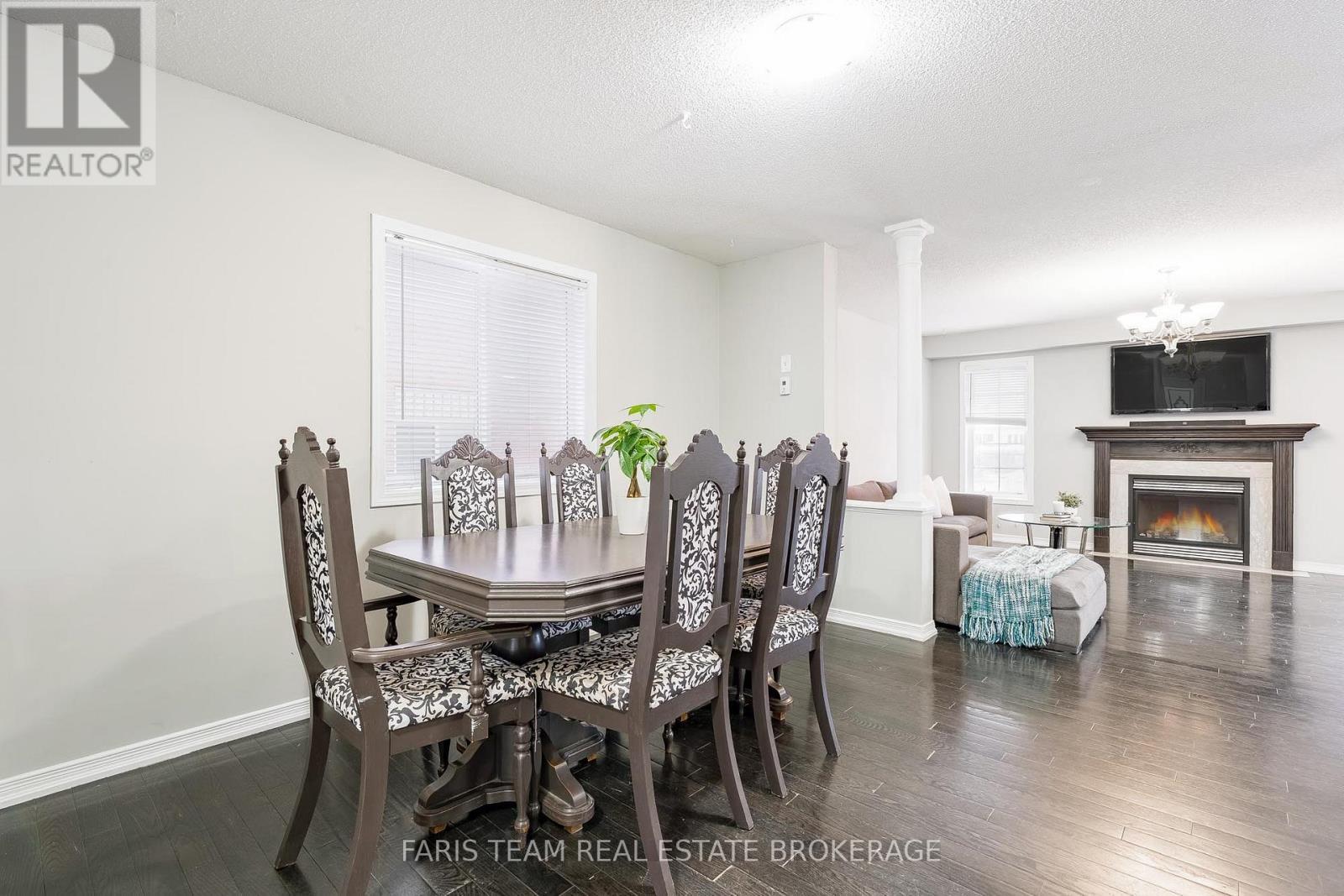 1373 Hunter Street, Innisfil, ON - Indoor Photo Showing Dining Room With Fireplace
