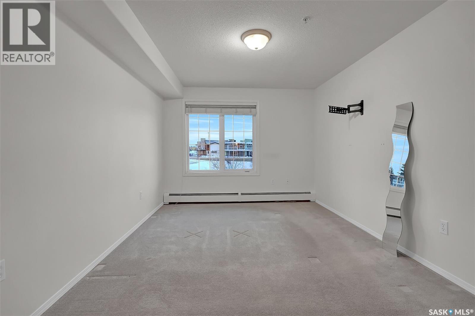 110 2300 Tell Place, Regina, SK - Indoor Photo Showing Other Room