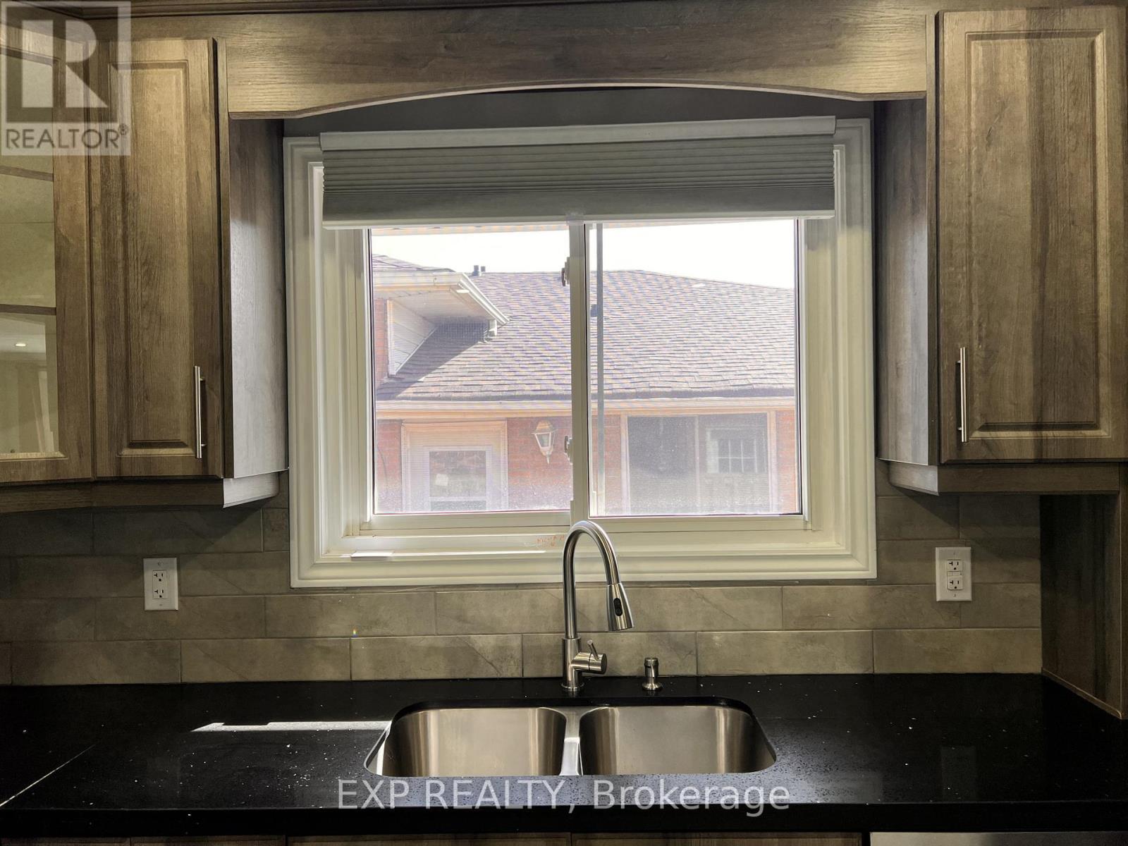 64 Gainsborough Road, Hamilton, ON - Indoor Photo Showing Kitchen With Double Sink