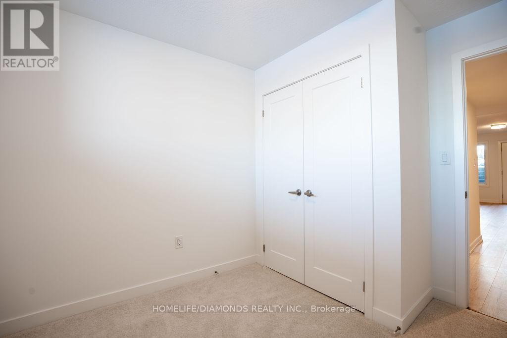 13 - 940 David Street N, Centre Wellington, ON - Indoor Photo Showing Other Room