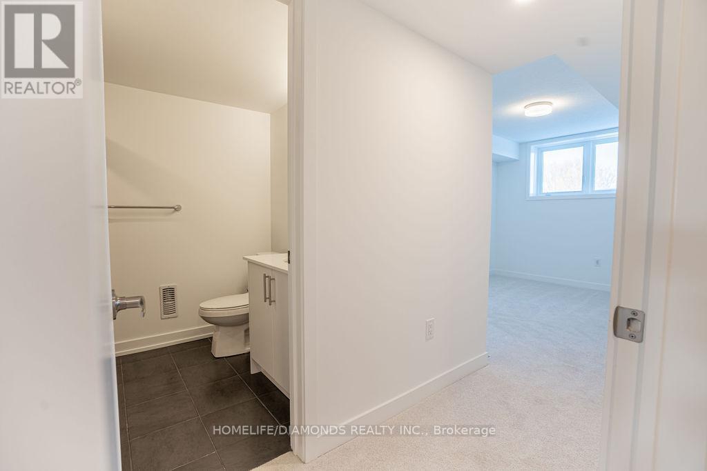 13 - 940 David Street N, Centre Wellington, ON - Indoor Photo Showing Bathroom