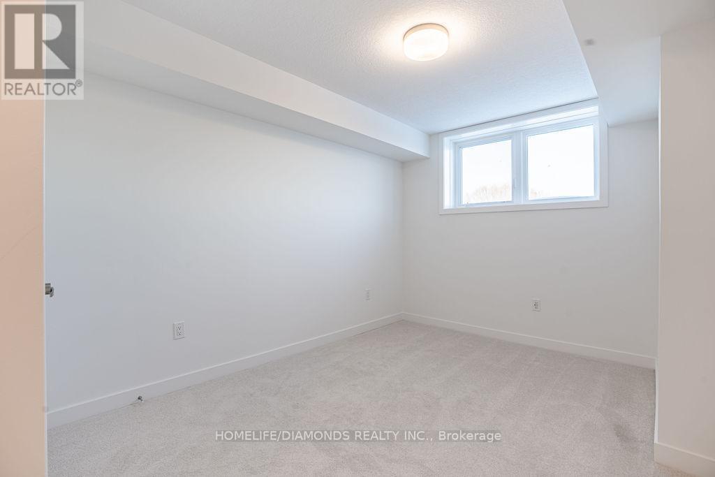 13 - 940 David Street N, Centre Wellington, ON - Indoor Photo Showing Other Room