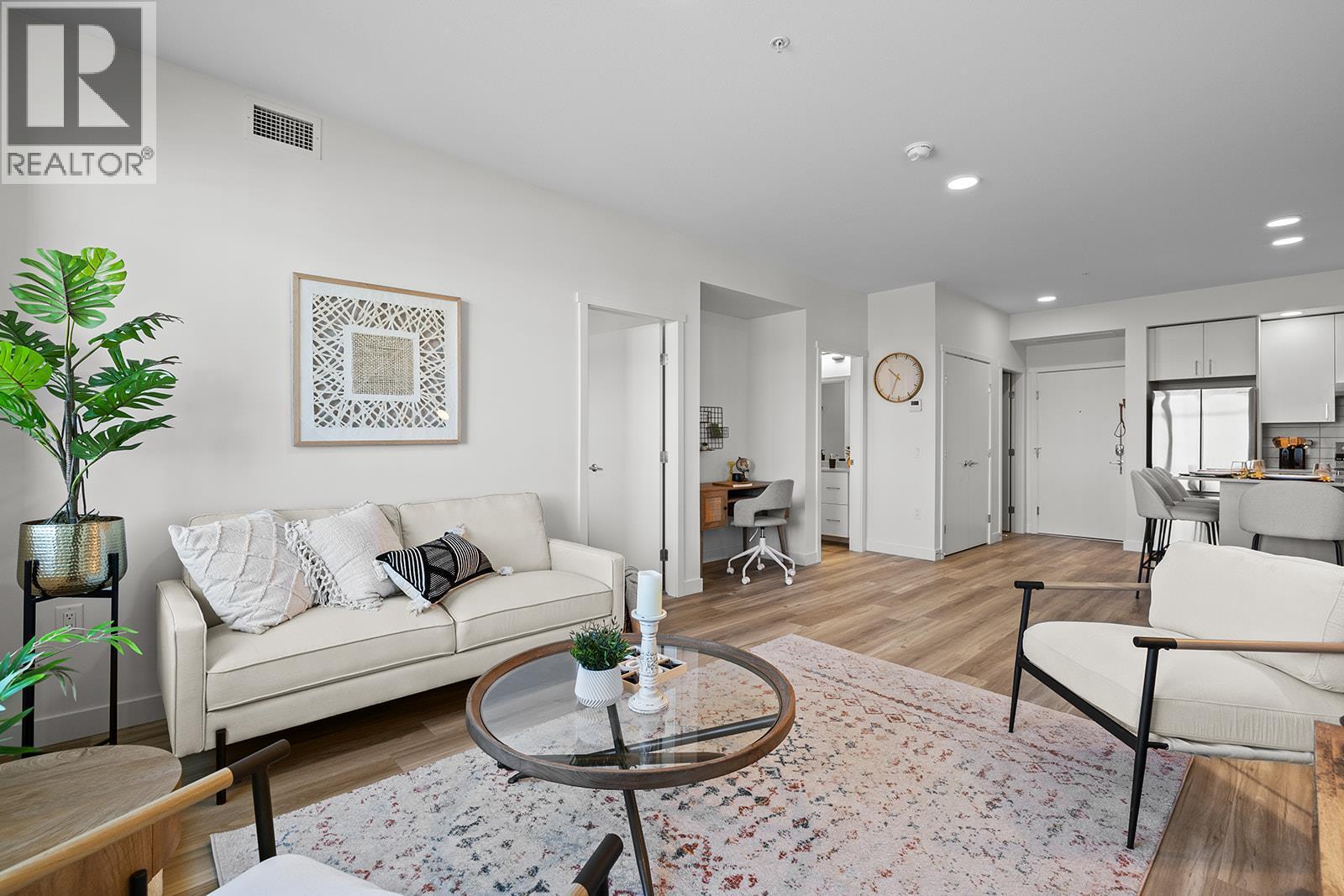 Photos are of a similar home; some features may vary - 1111 Frost Road Unit# 310, Kelowna, BC - Indoor Photo Showing Living Room