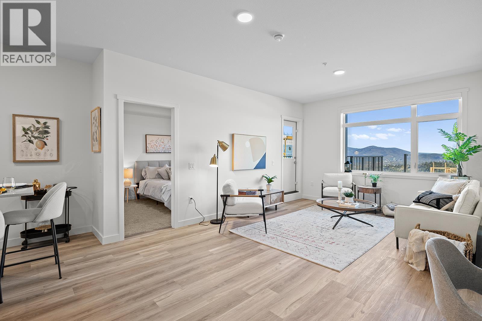 Photos are of a similar home; some features may vary - 1111 Frost Road Unit# 310, Kelowna, BC - Indoor Photo Showing Living Room