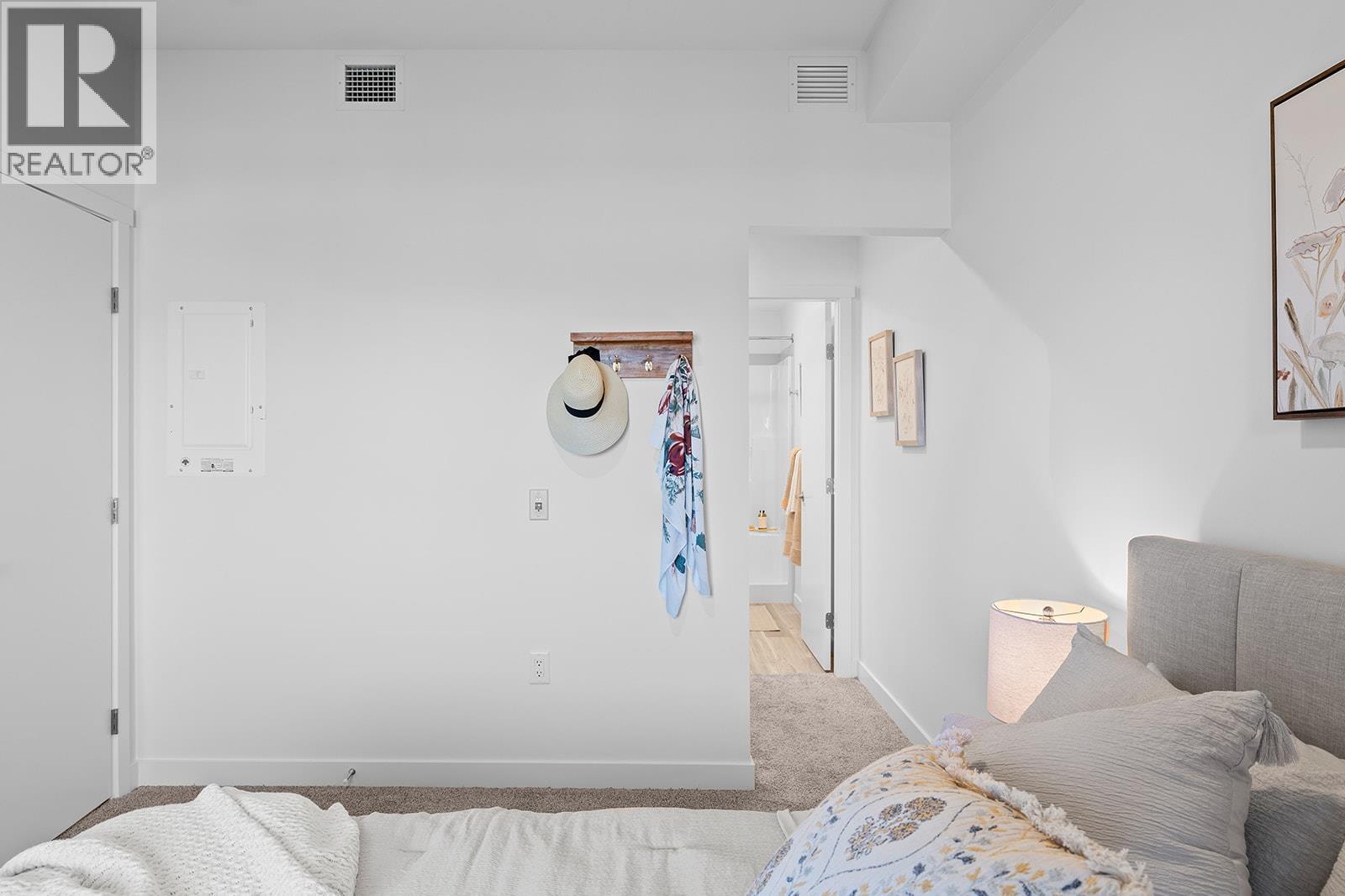 Photos are of a similar home; some features may vary - 1111 Frost Road Unit# 310, Kelowna, BC - Indoor Photo Showing Bedroom