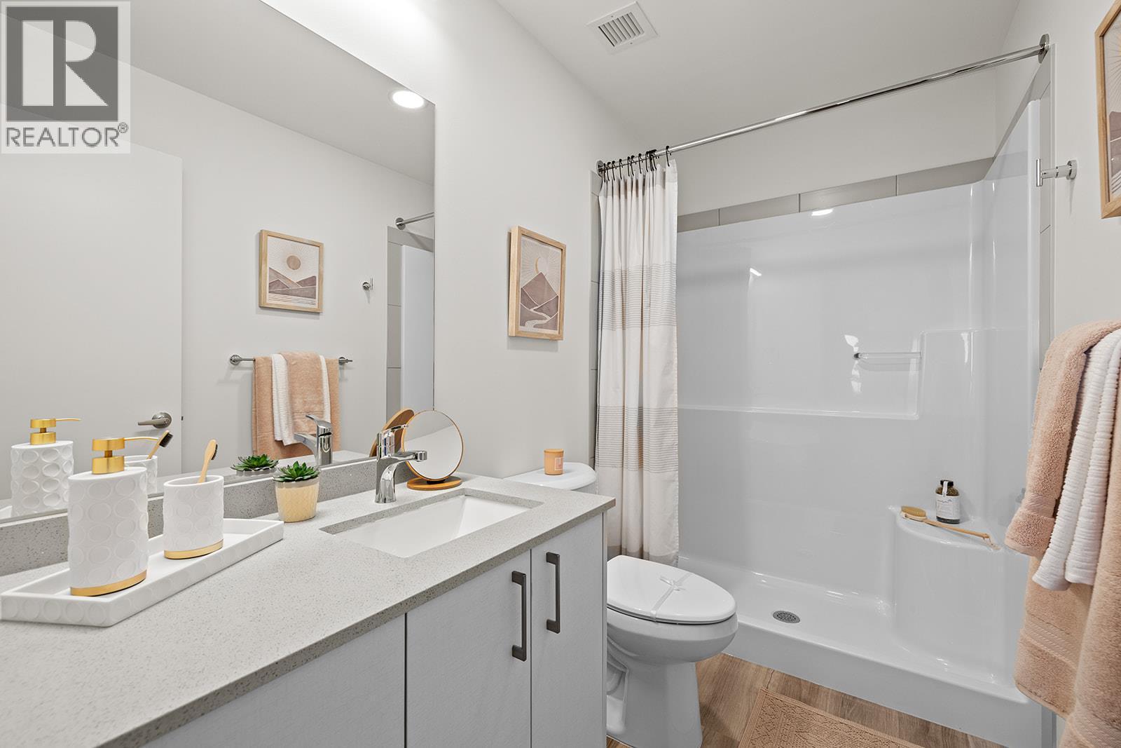 Photos are of a similar home; some features may vary - 1111 Frost Road Unit# 310, Kelowna, BC - Indoor Photo Showing Bathroom