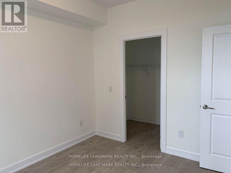# 1214 - 3220 William Coltson Avenue E, Oakville, ON - Indoor Photo Showing Other Room