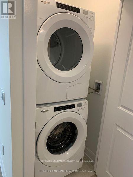 # 1214 - 3220 William Coltson Avenue E, Oakville, ON - Indoor Photo Showing Laundry Room