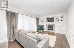 Family Room with Gas Fireplace & Custom Cabinetry -