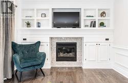 Family Room with Gas Fireplace & Custom Cabinetry -