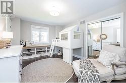 Second Bedroom with Hardwood Flooring -