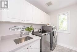 Convenient Laundry Room on the Upper Level -