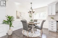 Open Concept Dining Area with Wainscoting -