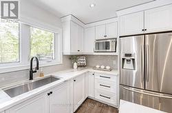 Kitchen Offers Quartz Countertops & S/S Appliances -