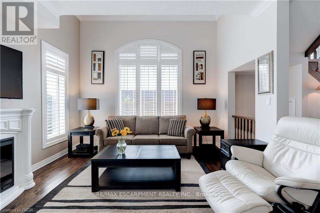 2 Celestial Crescent, Hamilton, ON - Indoor Photo Showing Living Room With Fireplace