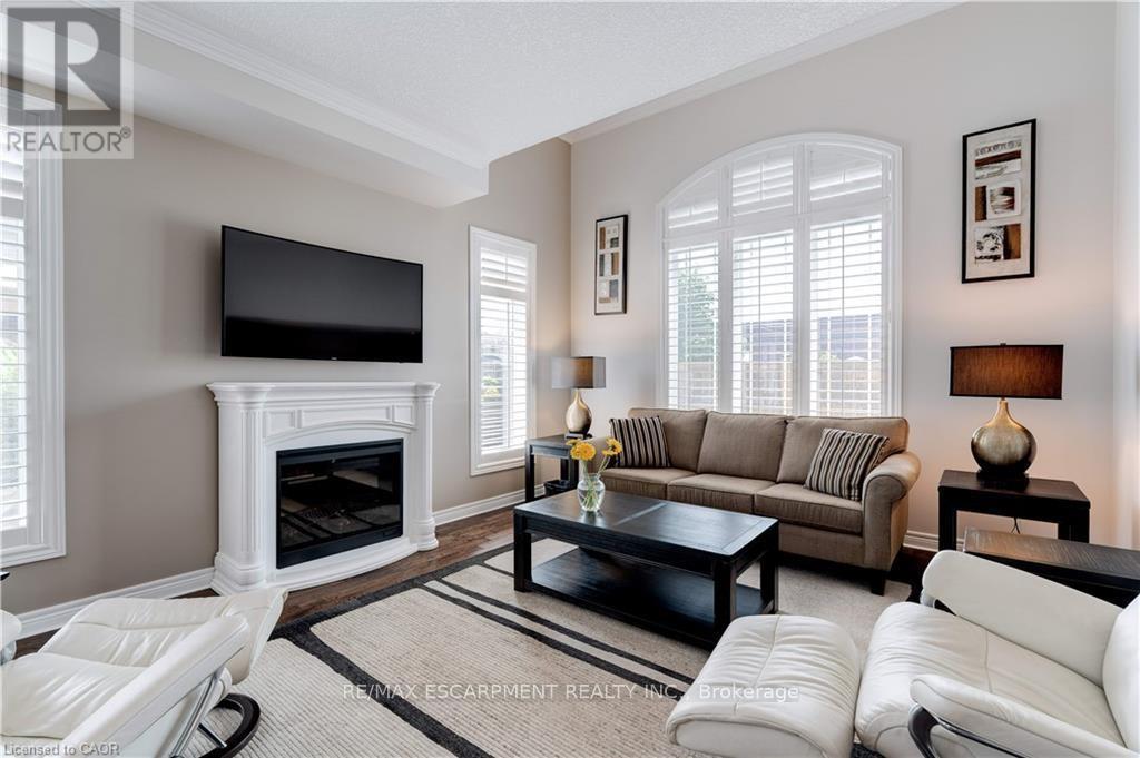 2 Celestial Crescent, Hamilton, ON - Indoor Photo Showing Living Room With Fireplace