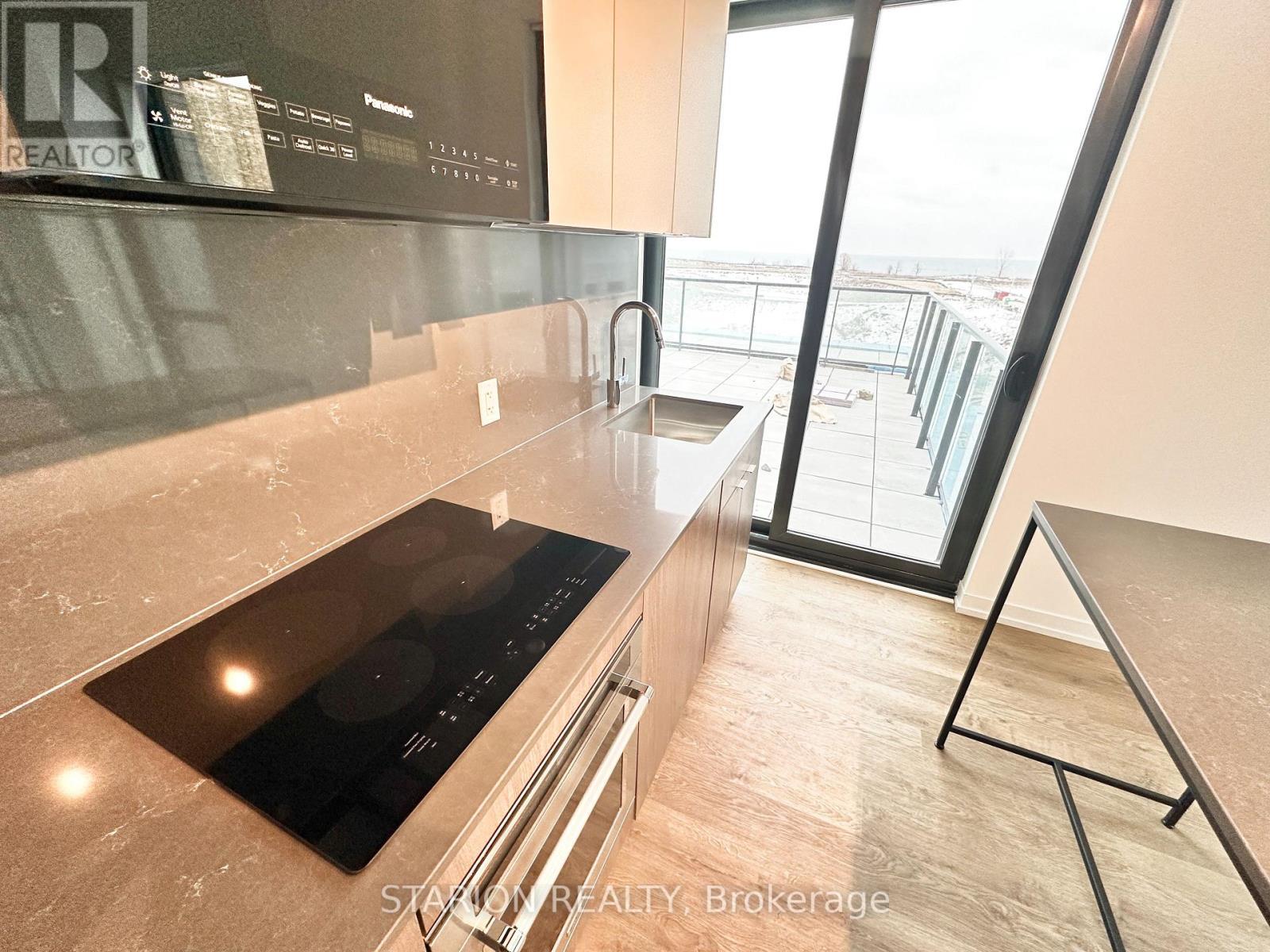 205 - 251 Masonry Way, Mississauga, ON - Indoor Photo Showing Kitchen With Upgraded Kitchen