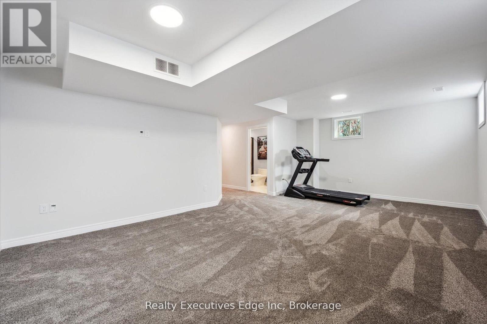 55 Povey Road, Centre Wellington (Fergus), ON - Indoor Photo Showing Gym Room