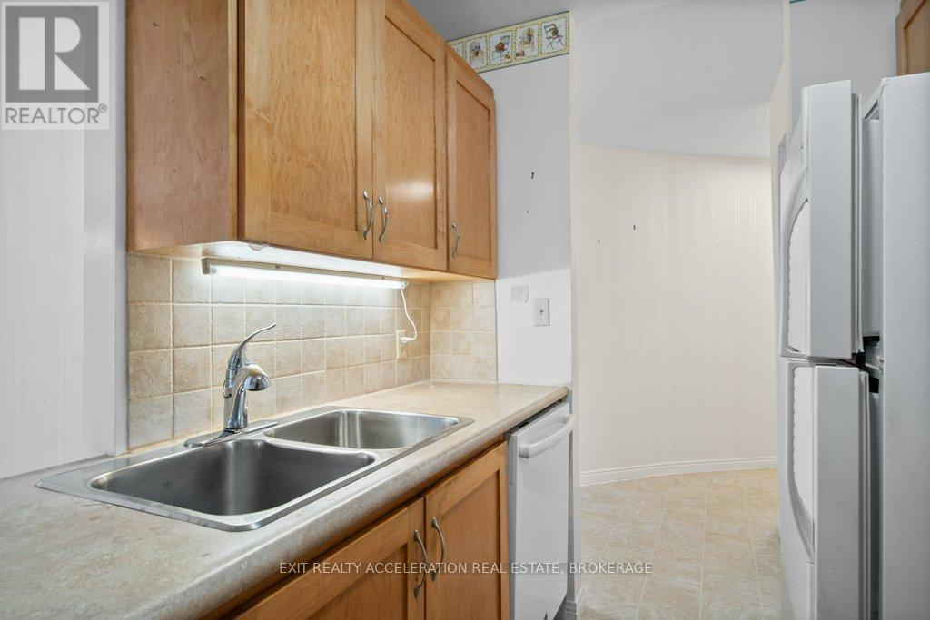 204 - 11 Centre Street, Greater Napanee (Greater Napanee), ON - Indoor Photo Showing Kitchen With Double Sink