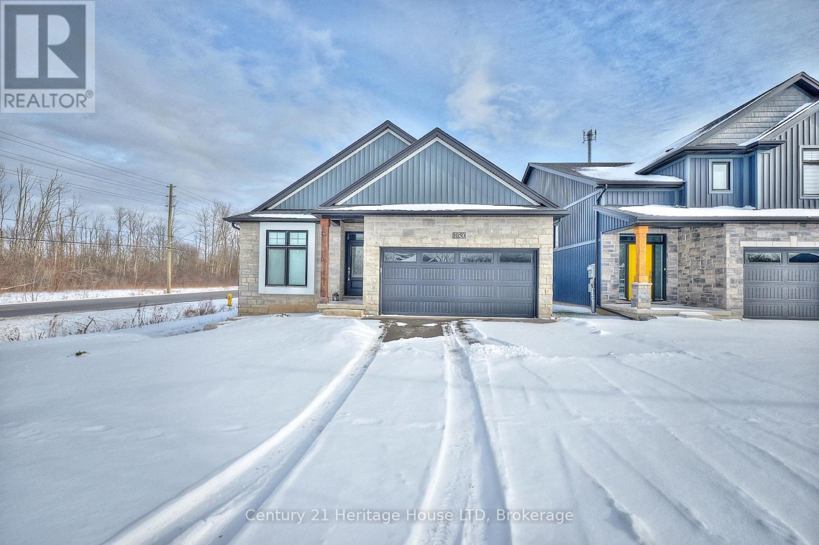 Front of the property in winter - 1050 Kettle Court, Fort Erie (Crescent Park), ON - Outdoor With Facade