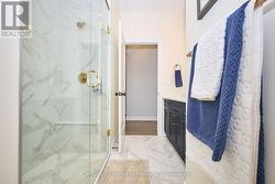 3 PC bathroom facing the hallway -