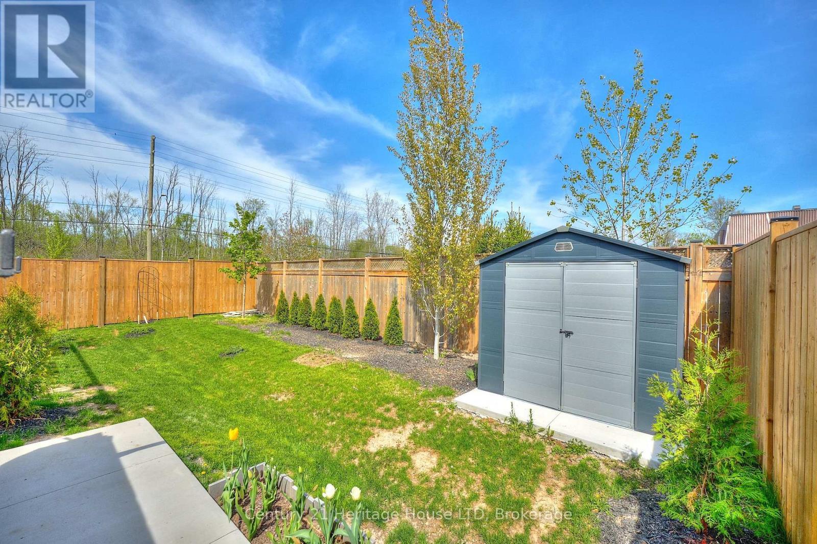 Fenced in yard with shed - 1050 Kettle Court, Fort Erie (Crescent Park), ON - Outdoor