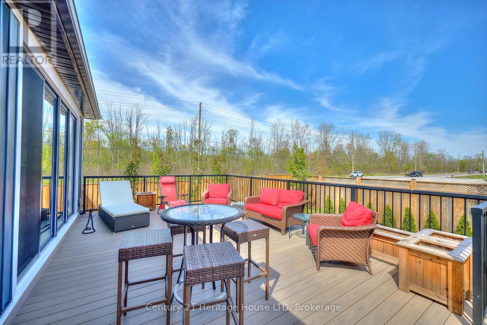 View of the deck from the other side - 1050 Kettle Court, Fort Erie (Crescent Park), ON - Outdoor With Deck Patio Veranda With Exterior