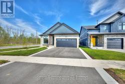 Paved driveway & double car garage -