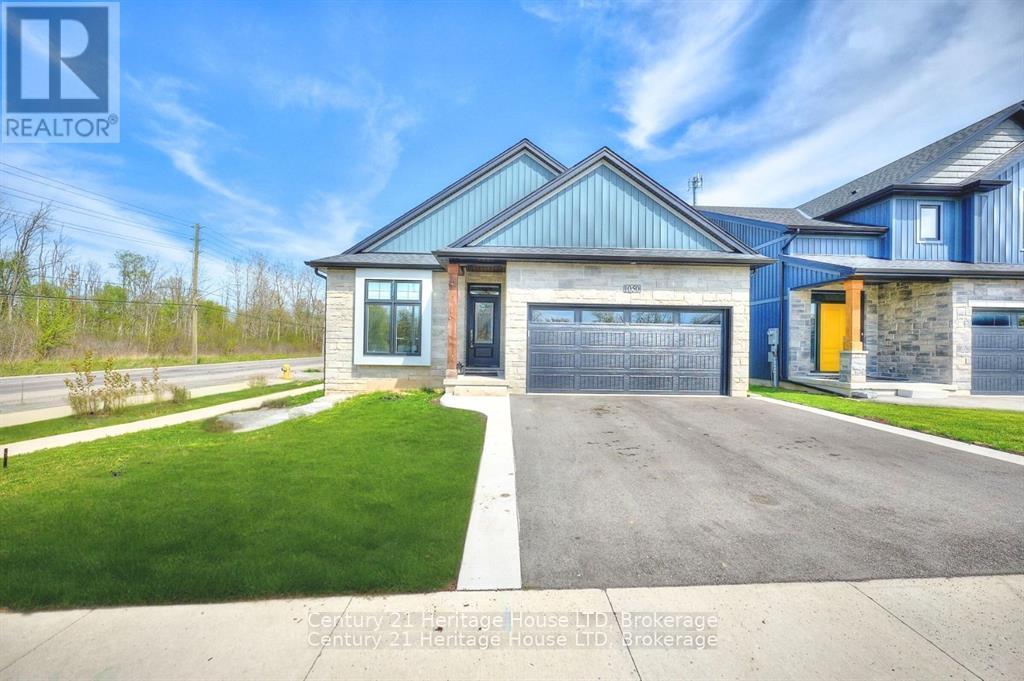 Front view of the property with double garage - 1050 Kettle Court, Fort Erie (Crescent Park), ON - Outdoor With Facade