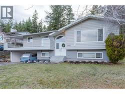 front of home with double carport -