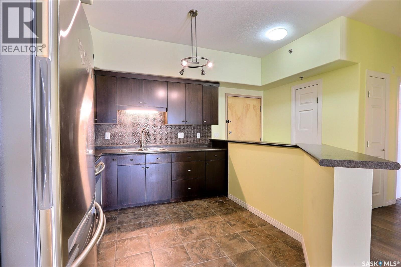 201 220 Mccallum Avenue, Birch Hills, SK - Indoor Photo Showing Kitchen