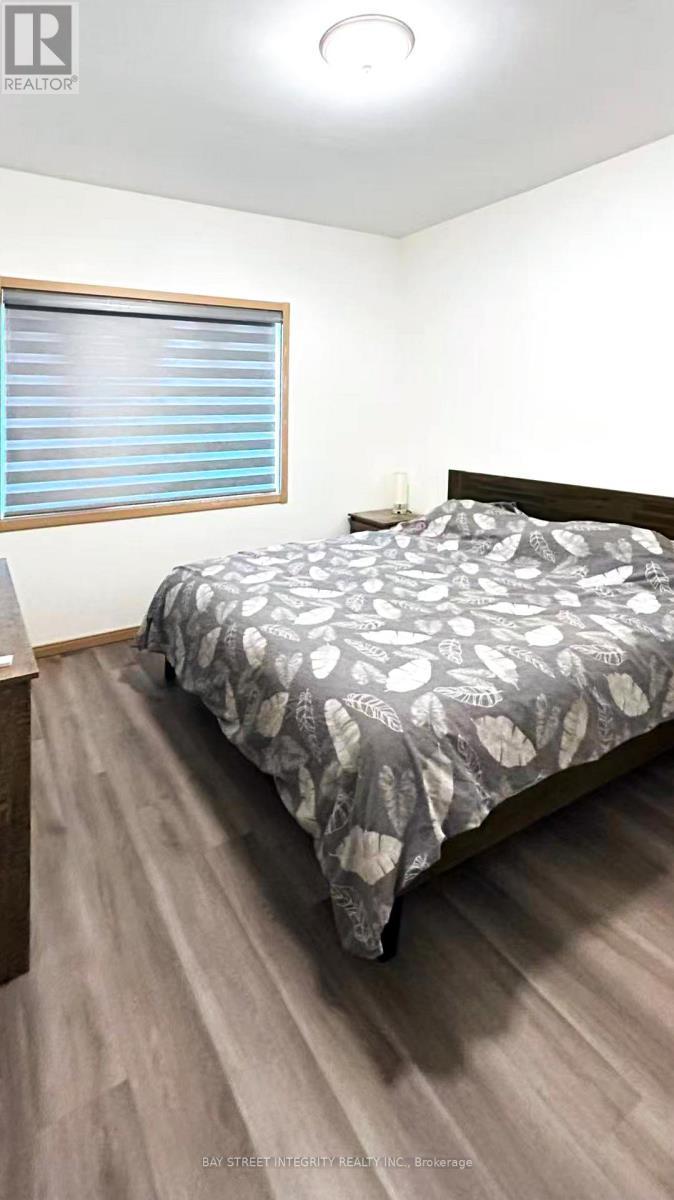 200 Chester Le Boulevard, Toronto, ON - Indoor Photo Showing Bedroom